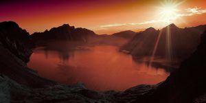 puesta de sol en lago de montaña